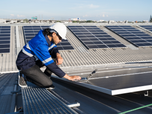 A solar energy auditor inspecting a property to identify energy-saving opportunities."