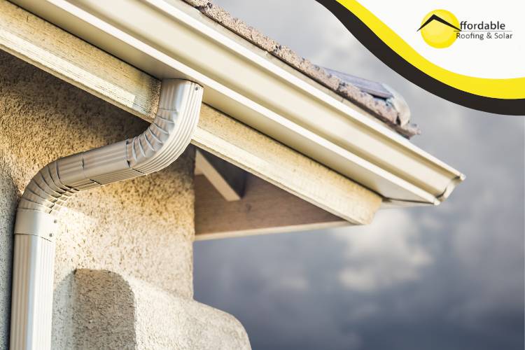 Storm clouds over a secure roof inspected by San Jose roofing services.